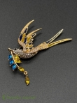 Брошь ласточка с веточкой